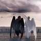 Aziraphale and Crowley watching Adam and Eve leave the Garden of Eden.